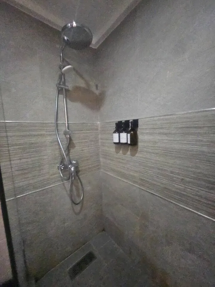Walk-in rain shower with luxury toiletries at Ciel Studio