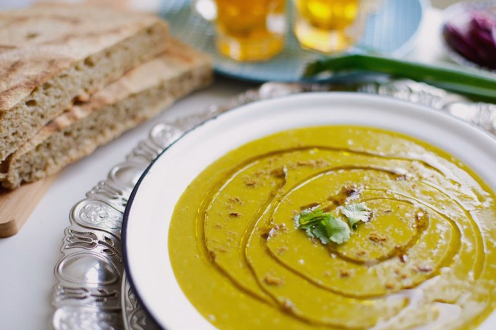 Bowl of traditional warm Moroccan soup seasoned with aromatic spices